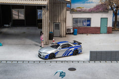 (Pre-Order) 1/64 Fuji FNSR34SBLBKW Nissan Skyline GT-R R34 Nismo Z-Tune Silver/ Blue w/ Black Wing